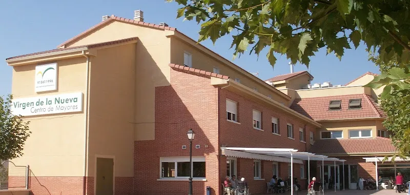 Fachada exterior de la residencia virgen de la nueva con entrada principal y terraza cubierta